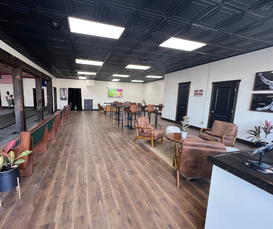 Lounge and viewing benches looking onto the mats at 144 BJJ