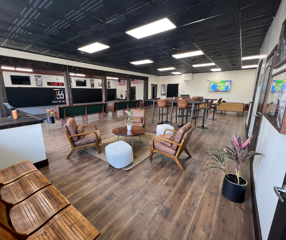 Academy lounge with the 144 BJJ mat space in view