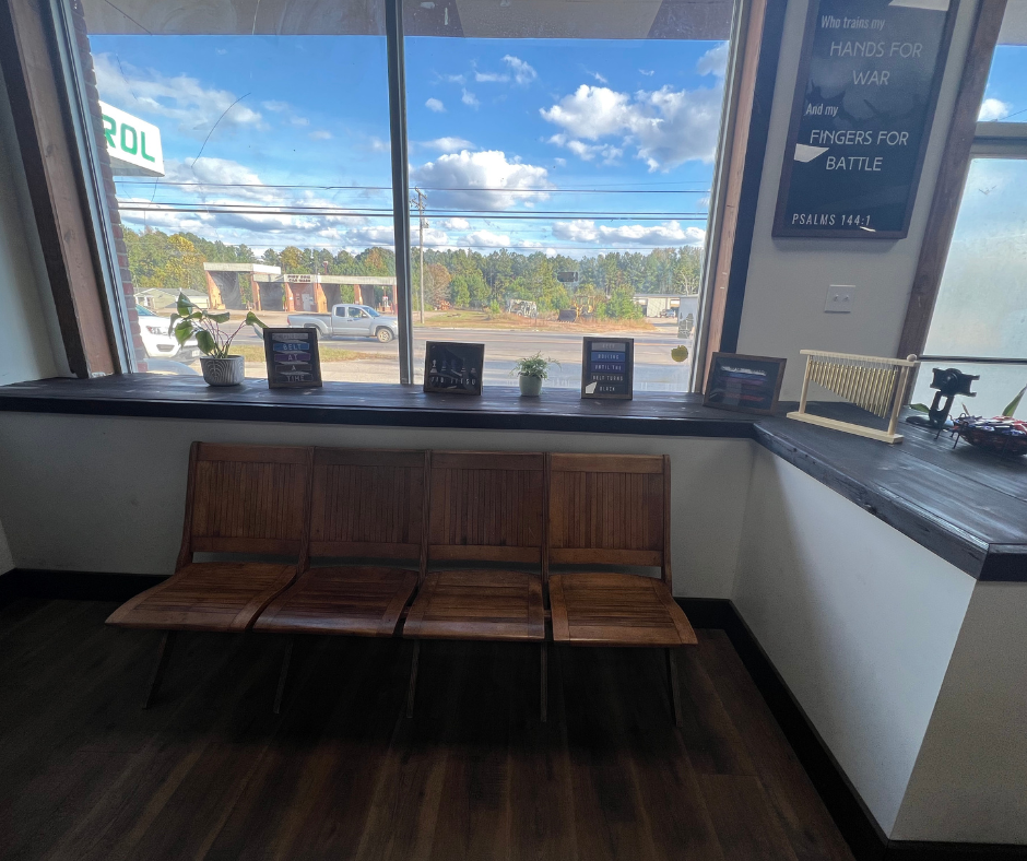 Front window seating with the Psalm 144:1 verse on the wall